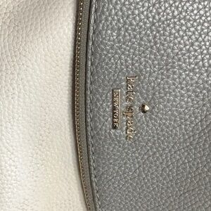 Beautiful color black gently used designer Kate Spade $695 retail final sale